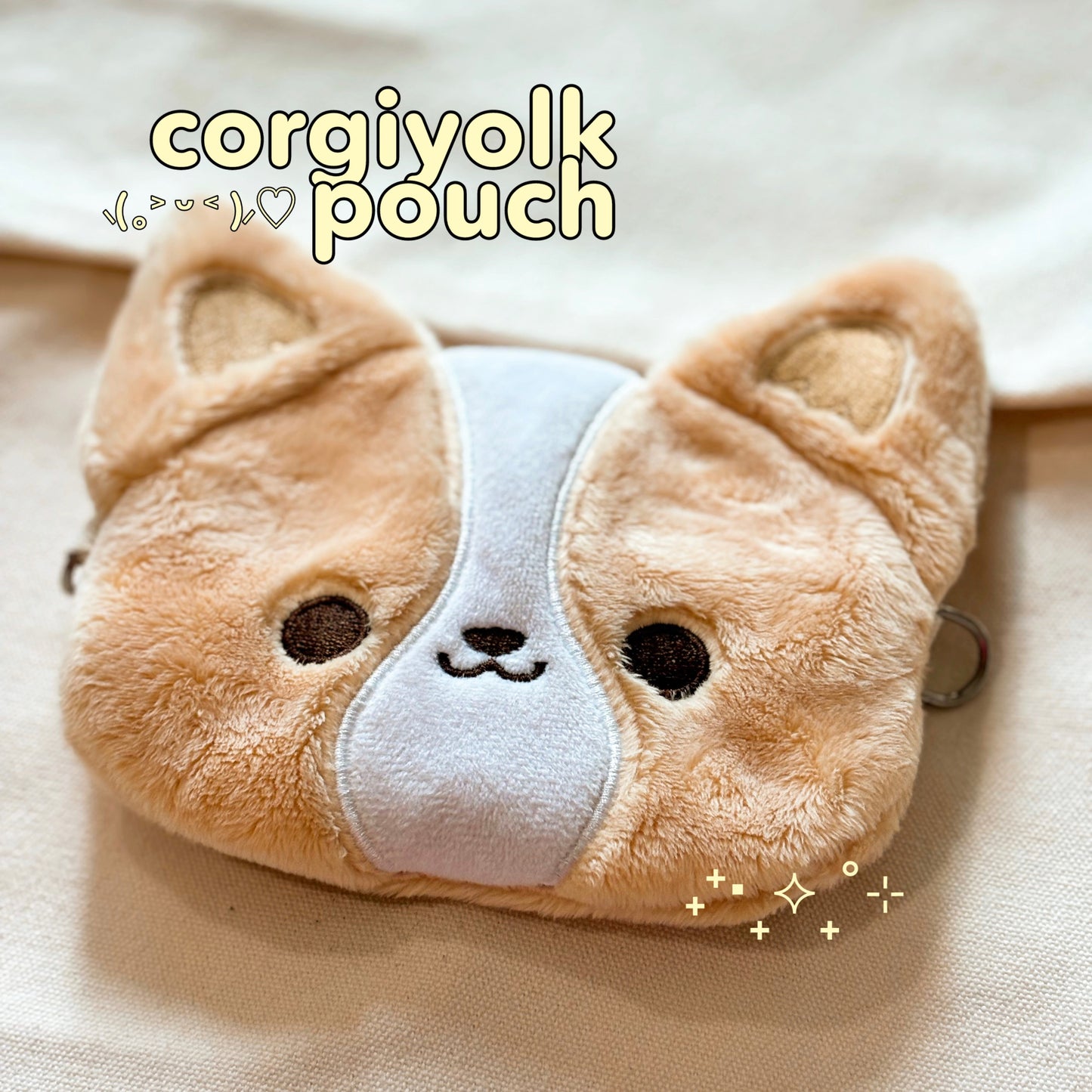 corgiyolk pouch to keep your essentials! comes with a card slot for easy access and features a uniquely designed corgi lining inside of the pouch 